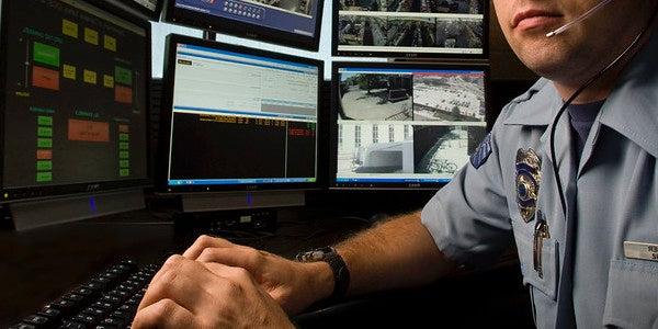 campus safety staff on computer